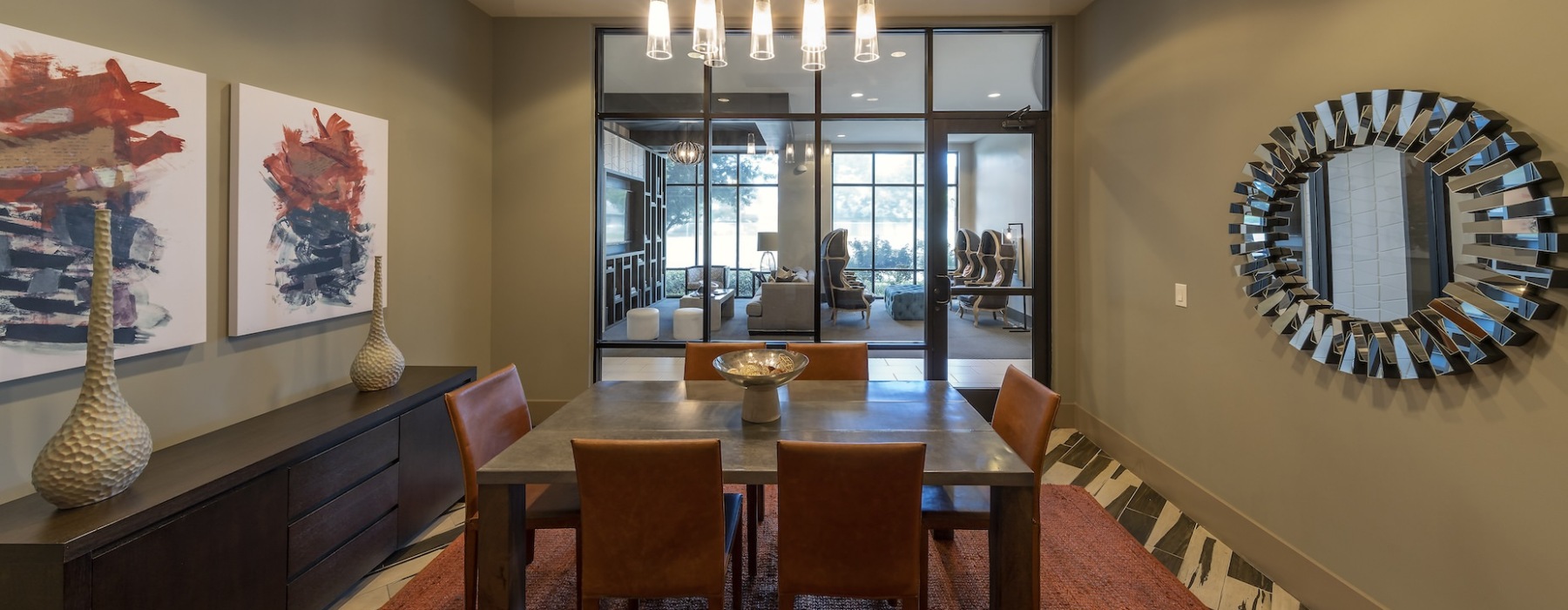 a spacious clubroom with a large table