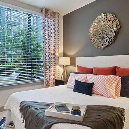 Bedroom with natural lighting and high ceilings